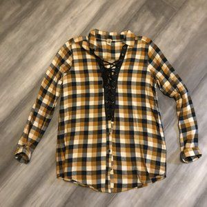 Gimmicks flannel top with lace up detail.